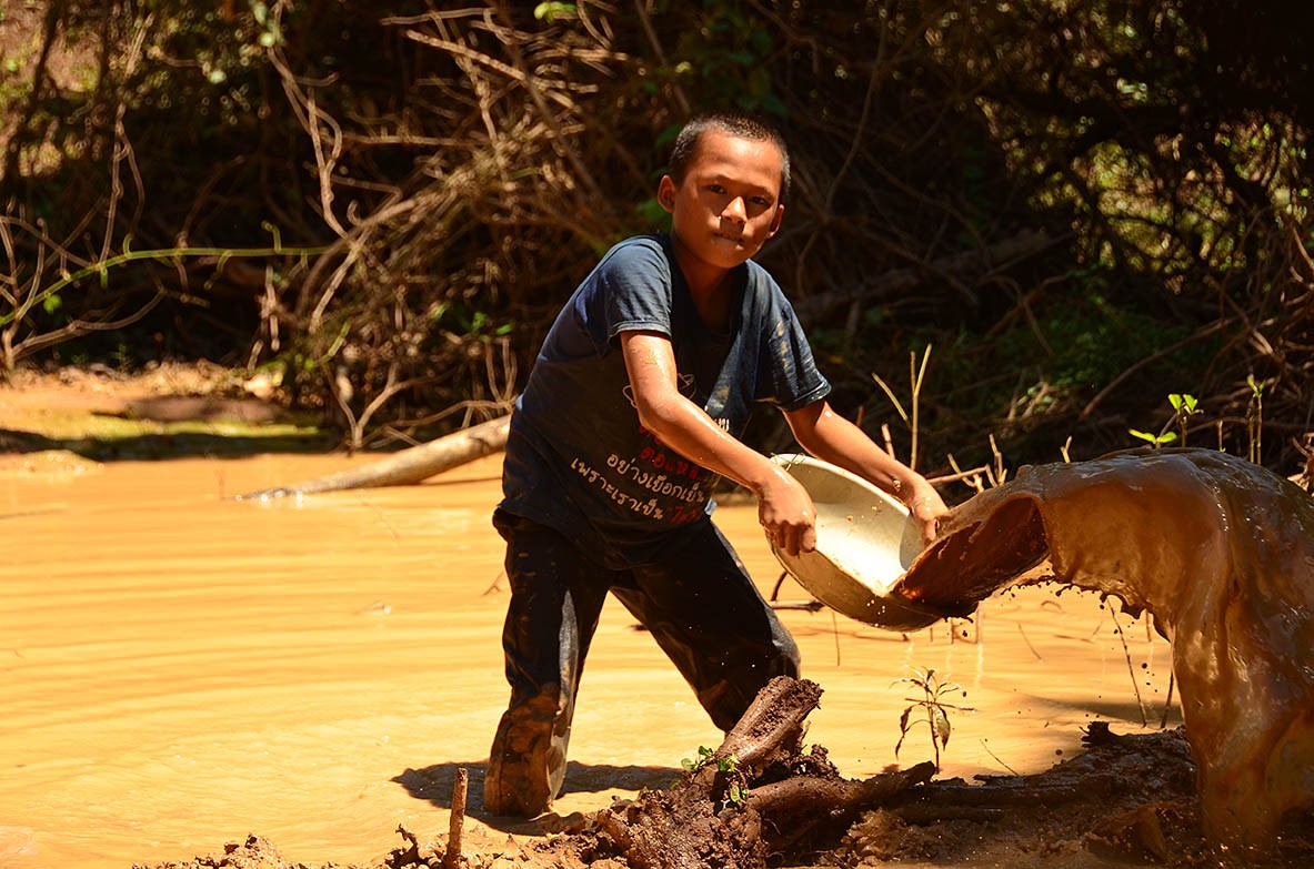 Kids playing in the mud